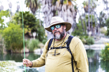 A fisherman at Echo Park Lake