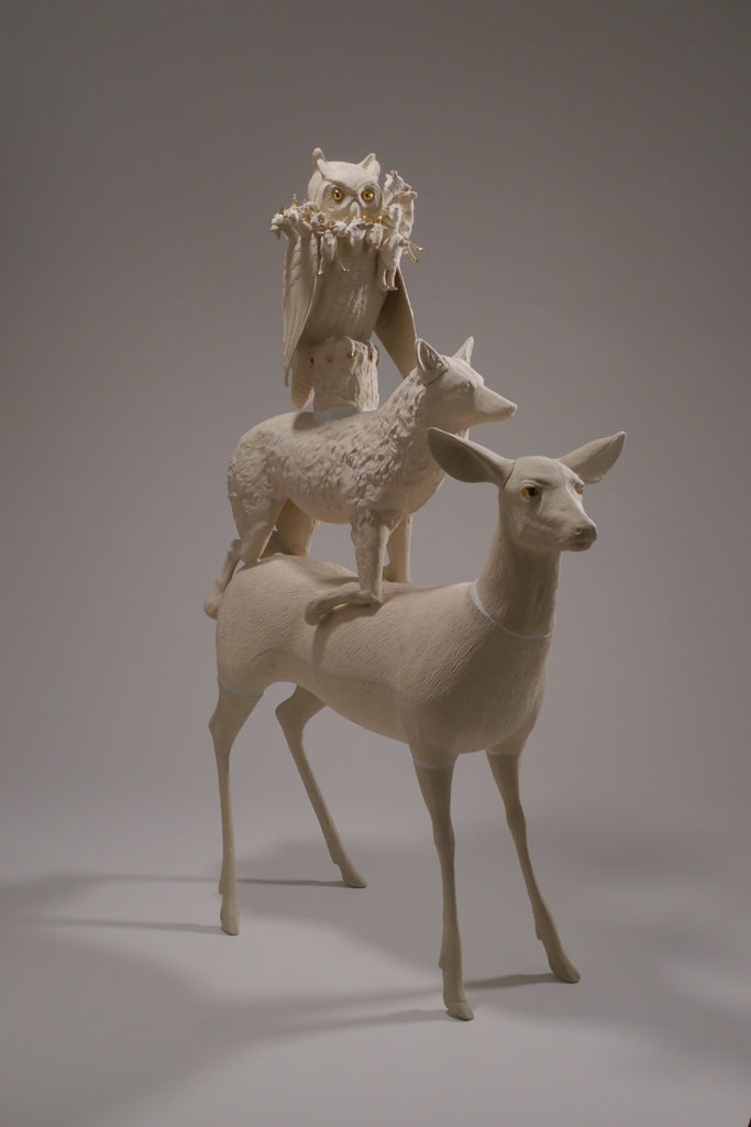 Owl, fox and deer statue