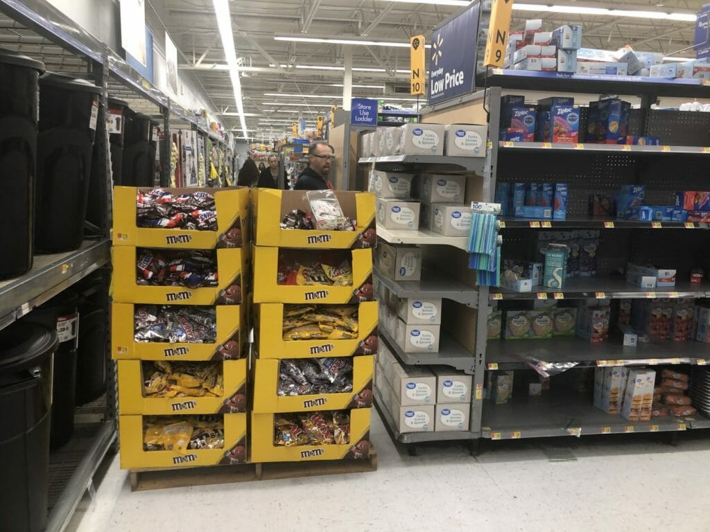 Two stacks of chocolate displays block the entrance to the paper goods aisle at the Walmart in Porter Ranch.