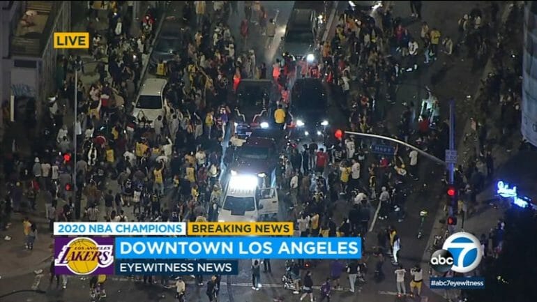 Revelers gather in downtown L.A. to celebrate the Laker's NBA championship win.