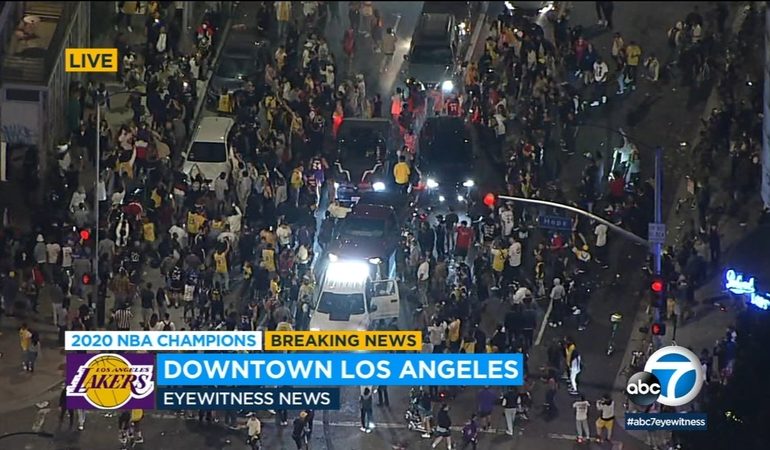 Revelers gather in downtown L.A. to celebrate the Laker's NBA championship win.
