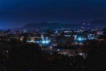 A shot of the Hollywood Hills and Griffith Observatory at night from the Westlake neighborhood of Los Angeles.